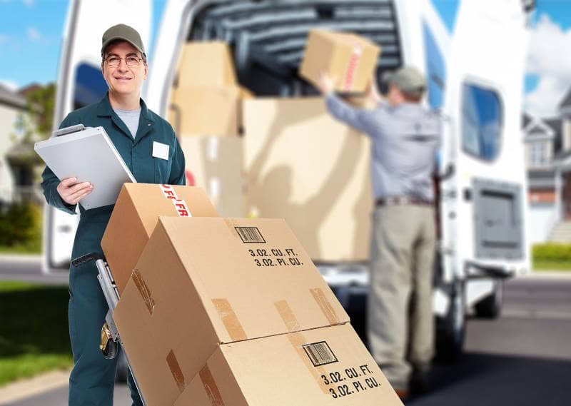 "Professional business movers in Vaughan loading and unloading boxes from a moving truck during a commercial relocation