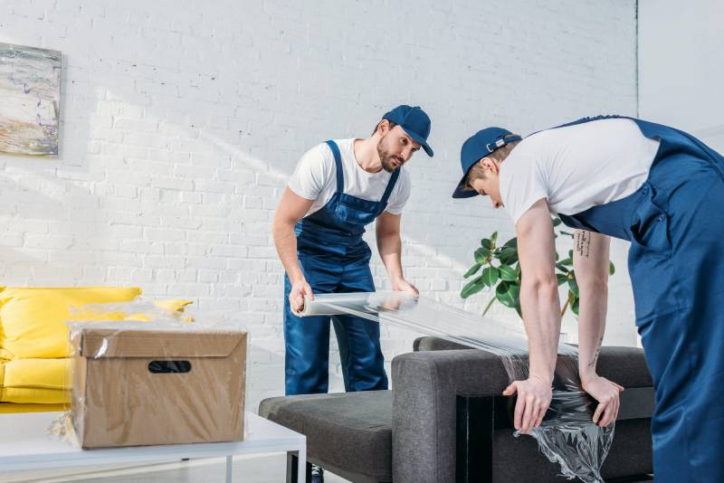 Professional Vaughan movers from SB Movers loading a moving truck efficiently.